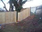 A 6ft featheredge closeboard fence featuring concrete moticed posts and gravel boards - a superior job to last many years.
