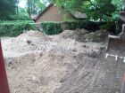 Heaps of tipped soil about to be graded