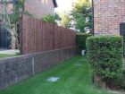 Another 6ft closeboard fence - this time using manufactured panels, 4 inch square timber post and deep timber gravel boards. First Class gravel boards are 2 inches thick - very solid job!