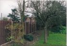 One side of 150 yards of closeboard panelled fencing in slotted concrete posts and gravel boards.